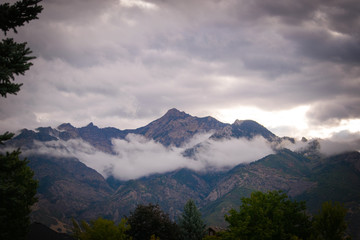 Clouds draping mountains