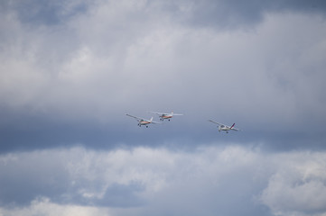 Fototapeta na wymiar small plane formation flying