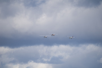 Fototapeta na wymiar small plane formation flying