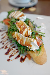 Bruschetta with arugula and cream