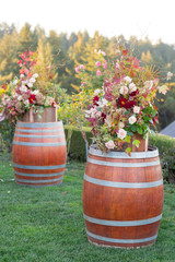 Flowers on Wine Barrel at Wedding Ceremony