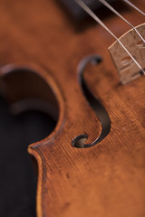 A violin on a dark background