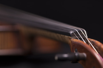 A violin on a dark background
