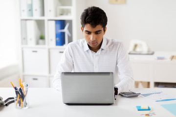 businessman with laptop working at office