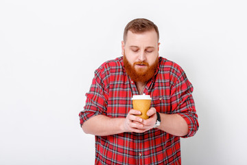 man drinks coffee to wake up