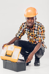 African American worker with tool box