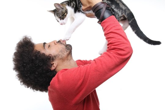 Afro man with a cat