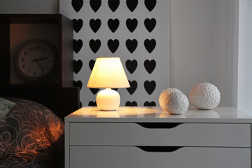 Bedroom interior with elegant table lamp