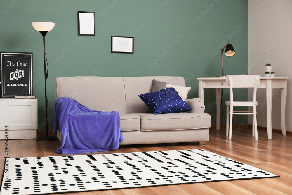 Poster Living room interior with comfortable sofa