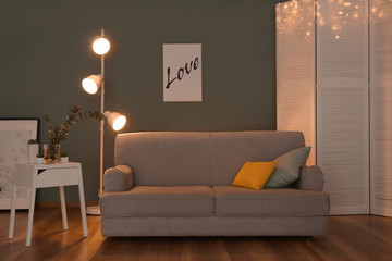 Living room interior with comfortable sofa