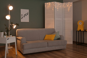 Living room interior with comfortable sofa