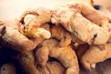 croissants with jam, home baking, shallow depth of field