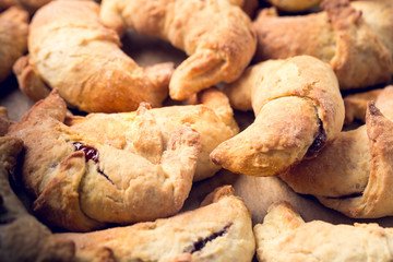 croissants with jam, home baking, shallow depth of field