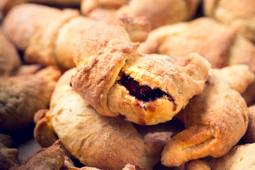 croissants with jam, home baking, shallow depth of field