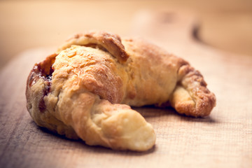 croissants with jam, home baking, shallow depth of field