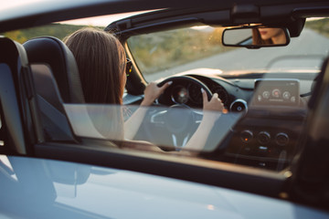 Woman road trip with car 