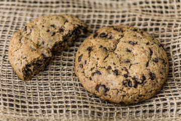 Freshly Baked Chocolate Cookies on a Burlap. Sweet Biscuits. Homemade pastry.