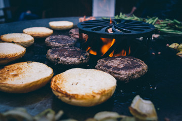 Feuerplatte grilled smoked BBQ Burger & Steak