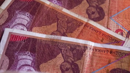 Macedonian money in slow motion close up view