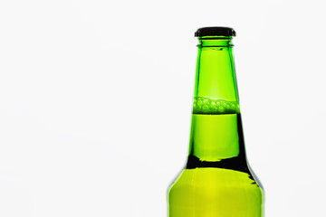 Glass bottle of beer on white background