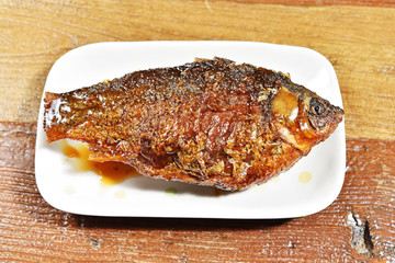 Braised crucian carp with scallion , Chinese cuisine