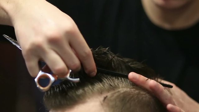 Cutting Hair Of Head In Barbershop