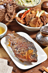 Braised crucian carp with scallion , Chinese cuisine