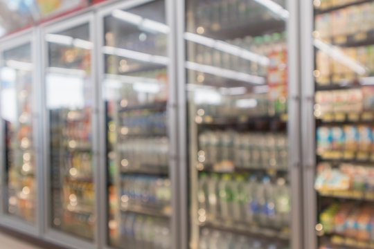 Abstract Blur Supermarket Convenience Store Refrigerator Aisle And Product Shelves Interior Defocused Background