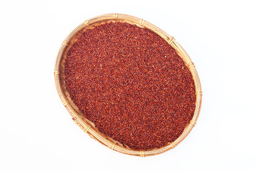 Obraz na płótnie Canvas Red quinoa grains in bamboo basket
