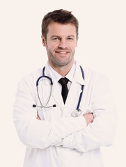 Fototapeta premium Portrait of confident medical doctor on white background