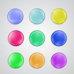 Set of 3d realistic buttons or badge templates, colorful plastic glossy knobs for internet navigation menus, bright badges for ads announcements, childish dragees isolated on white. © Manon Labe