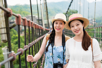 Women standing on the suspension bridge