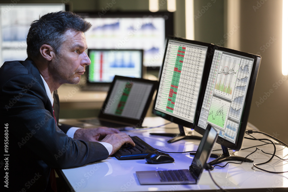 Poster Stock Market Broker Analyzing Graph On Multiple Computer Screen