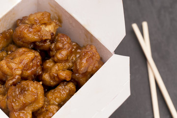 Chinese Food - Sweet and Sour, Orange or Lemon Chicken -  in a Take Out Container