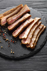 spicy smoked speck cut in slices