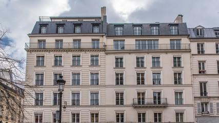 Fototapeta na wymiar Paris, beautiful building in the center, typical parisian facade 