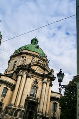 Fototapeta na wymiar Vertical Facade of Old Dominic Cathedral Street Lamp