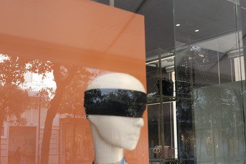 mannequin bandaged in the window