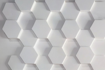 Hexagons white texture decorative stucco plaster wall as a background for elite loft apartments