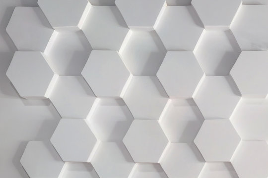 Hexagons white texture decorative stucco plaster wall as a background for elite loft apartments