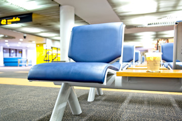 Coffee and chair for waiting in airport.
