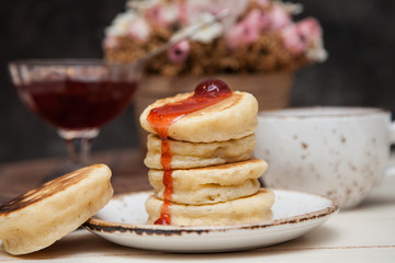 Pancakes with strawberry syrup
