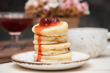 Pancakes with strawberry syrup
