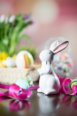 Happy easter. Easter eggs and easter decoration on the wooden table.