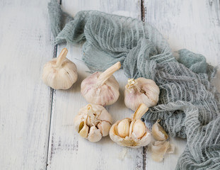 fresh garlic on a wooden table