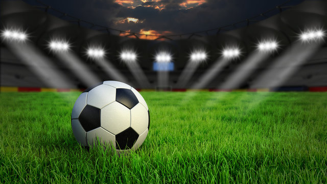 Fototapeta Fußball auf Rasen im Stadion bei Nacht mit Scheinwerfern, 3D Rendering