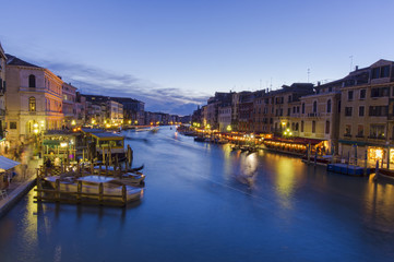 Fototapeta na wymiar Grand Canal in Venice, Italy. Night scene from Rialto Bridge