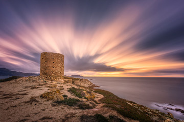 Dramatic sunset at Punta Spanu on the coast of Corsica