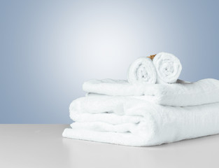 Stack of folded white spa towels