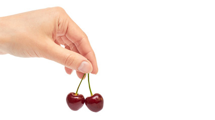 Beautiful female hand holds cherry gesture. Isolated on white background. copy space, template.